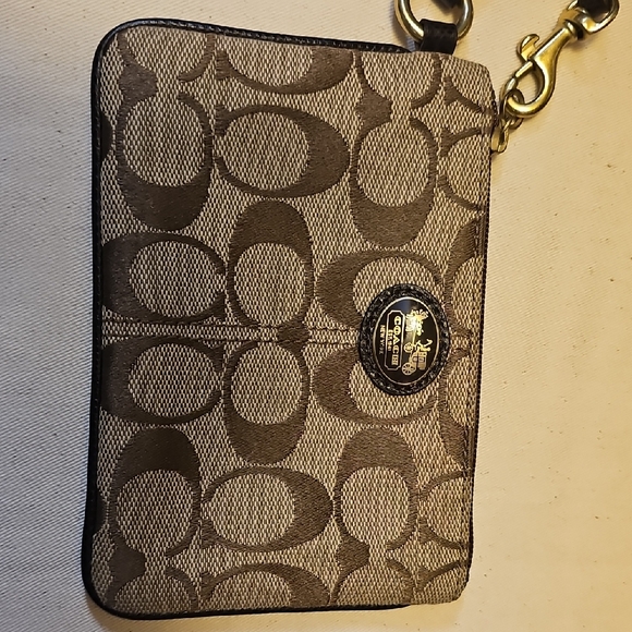 Coach Handbags - Coach Canvas Black and Tan Signature Wristlet
